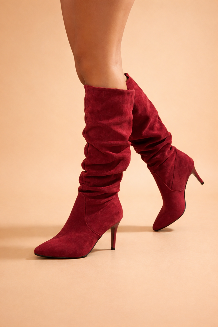 Modern women's slouch knee-high boots with heels. Versatile fall/winter fashion boots.