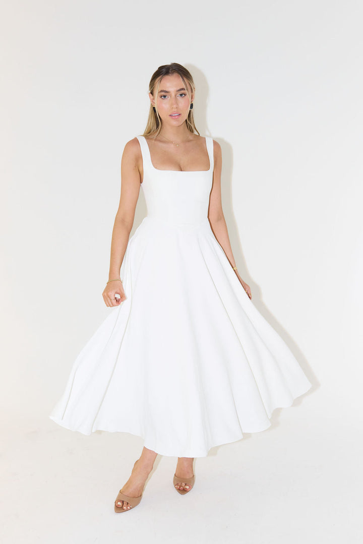 Elegant women's square neck sleeveless midi dress, perfect for summer fashion & versatile occasions.