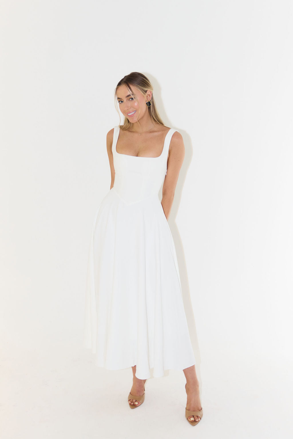Classic black elegant square neck midi dress, sleeveless & fashionable for women's summer style.
