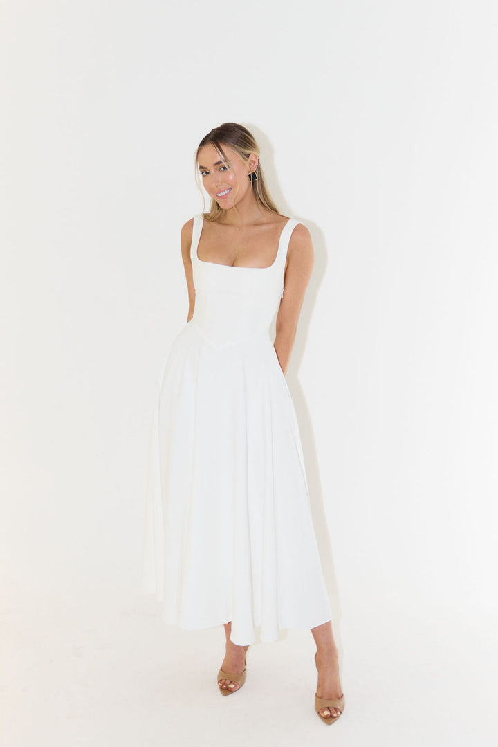 Classic black elegant square neck midi dress, sleeveless & fashionable for women's summer style.