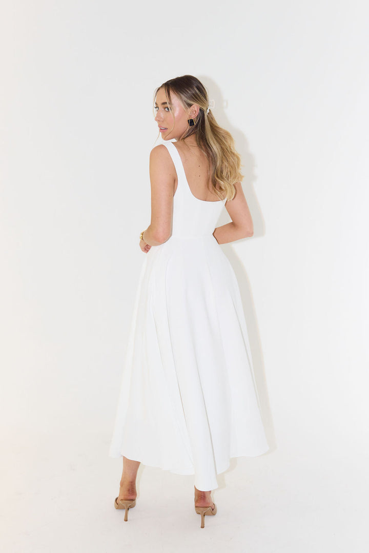 Chic white square neck sleeveless midi dress, a flattering and elegant summer wear for women.