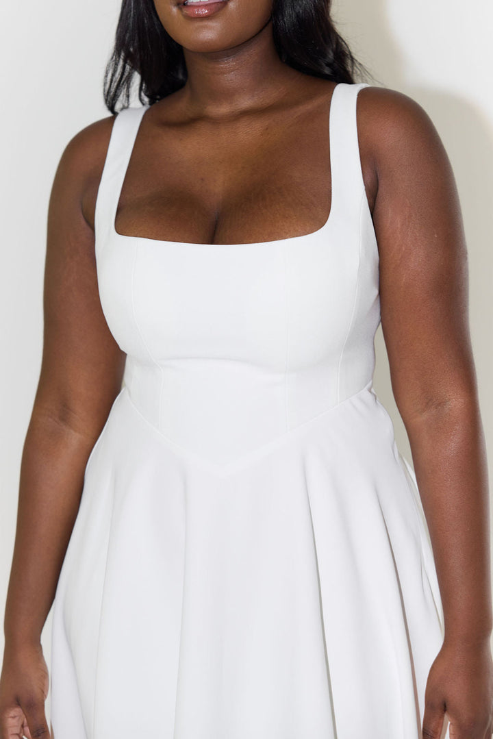 Sophisticated women's square neck sleeveless midi dress, a beautiful choice for elegant occasions.