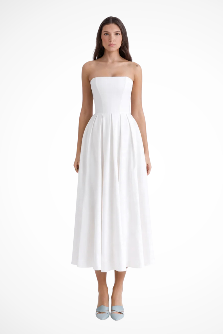 Elegant women's strapless corset midi dress with a flowing flared skirt, perfect for formal events & parties.