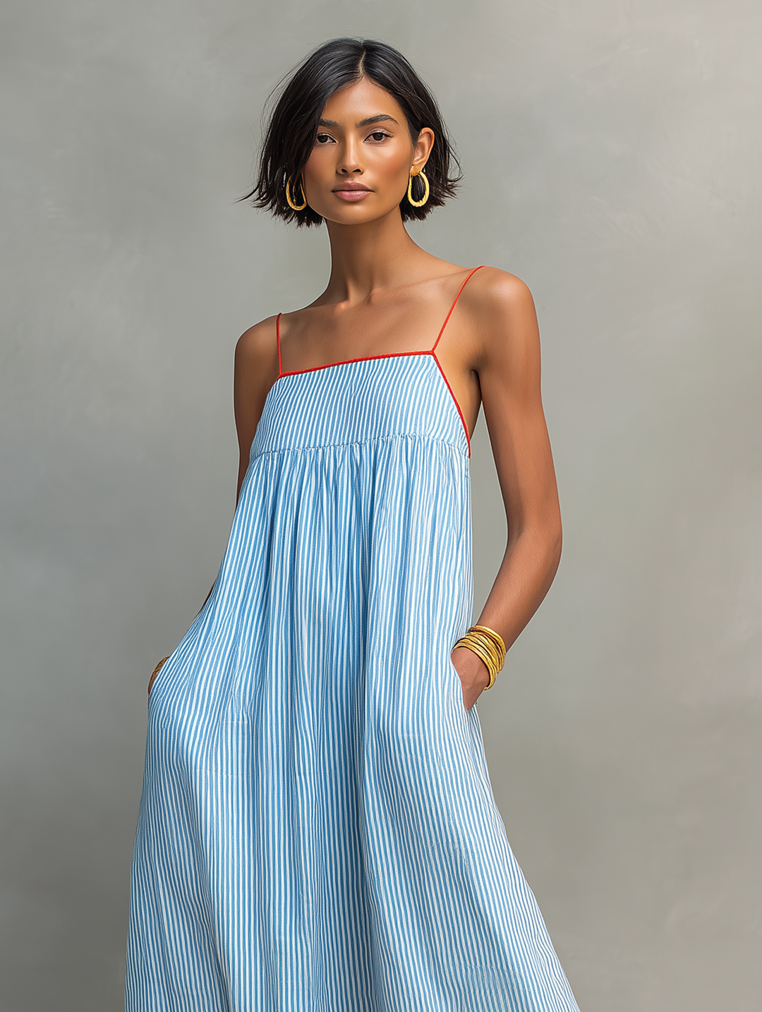 Elegant women's summer maxi dress with a beautiful striped design and adjustable spaghetti straps.