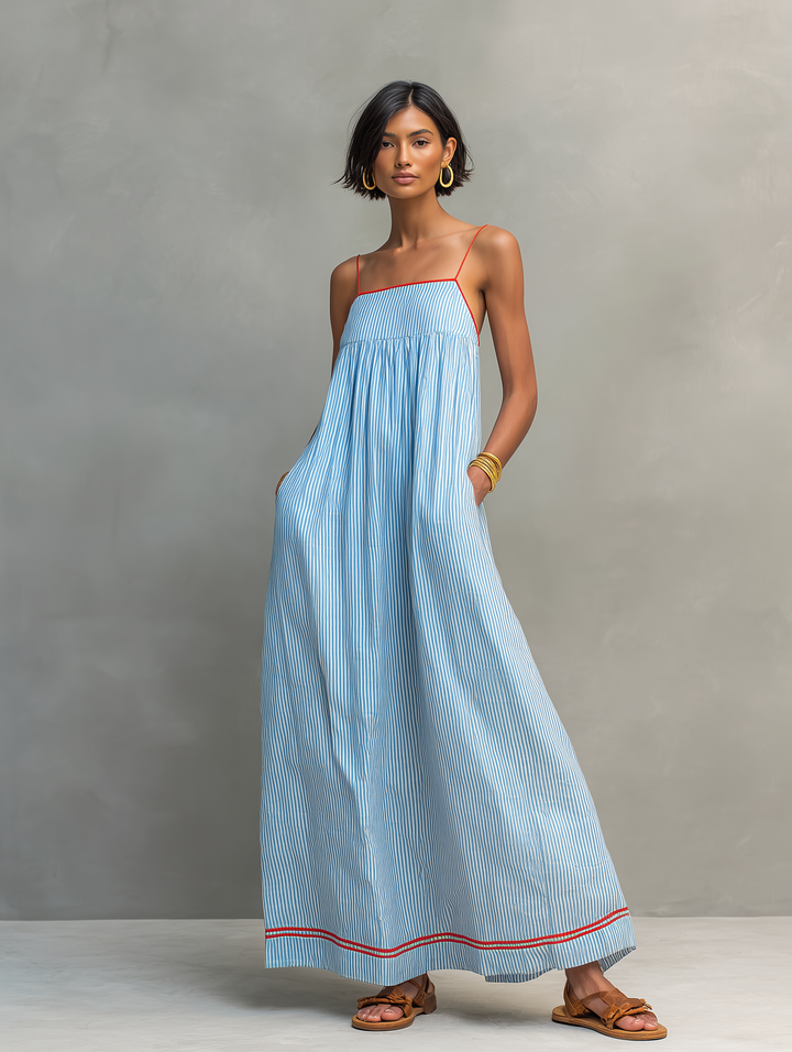 Women's elegant striped maxi dress with spaghetti straps, a must-have for summer fashion.