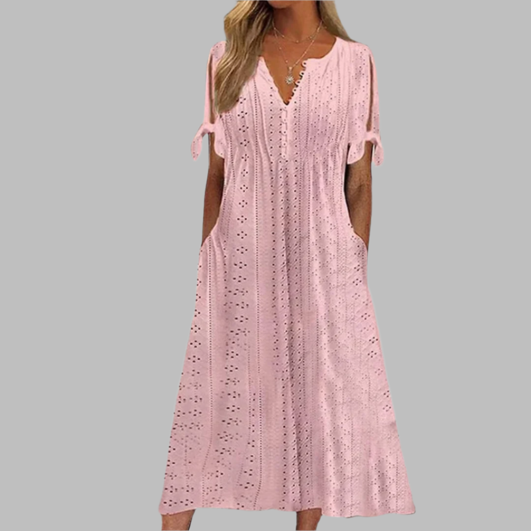 Chic women's summer midi dress, blending elegant and boho styles. Versatile for casual outings or vacations.