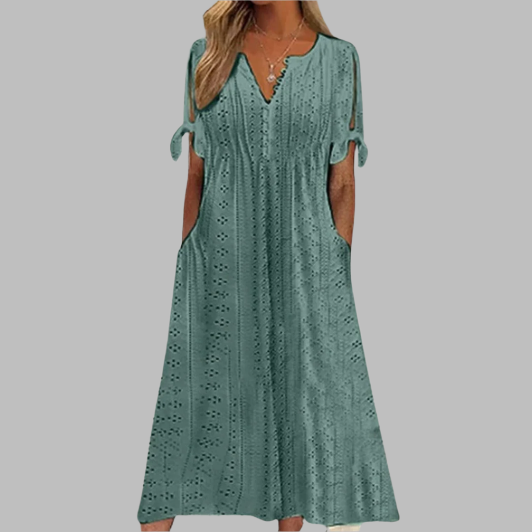 Boho summer midi dress for women, featuring elegant details and a comfortable flowy fit for vacations.