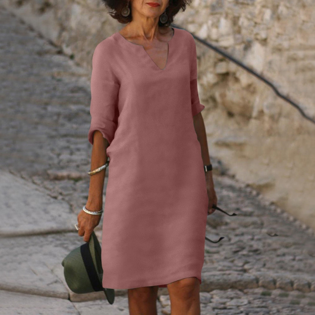 Stylish lightweight midi dress, perfect for women seeking comfortable and elegant summer fashion.