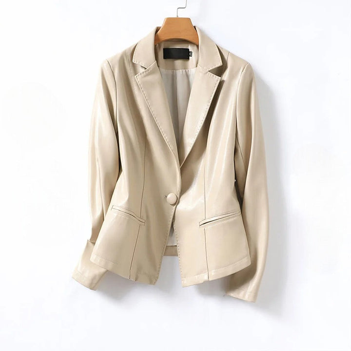 Black women's elegant tailored blazer jacket, a professional and chic outerwear option for formal occasions.