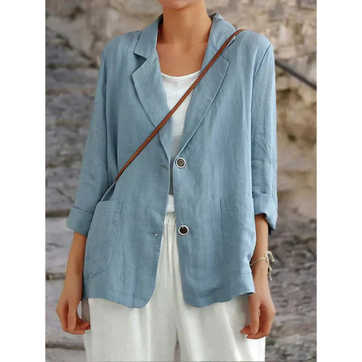 Elegant women's tailored blazer jacket, lightweight, ideal for smart casual or office wear. Versatile spring style.