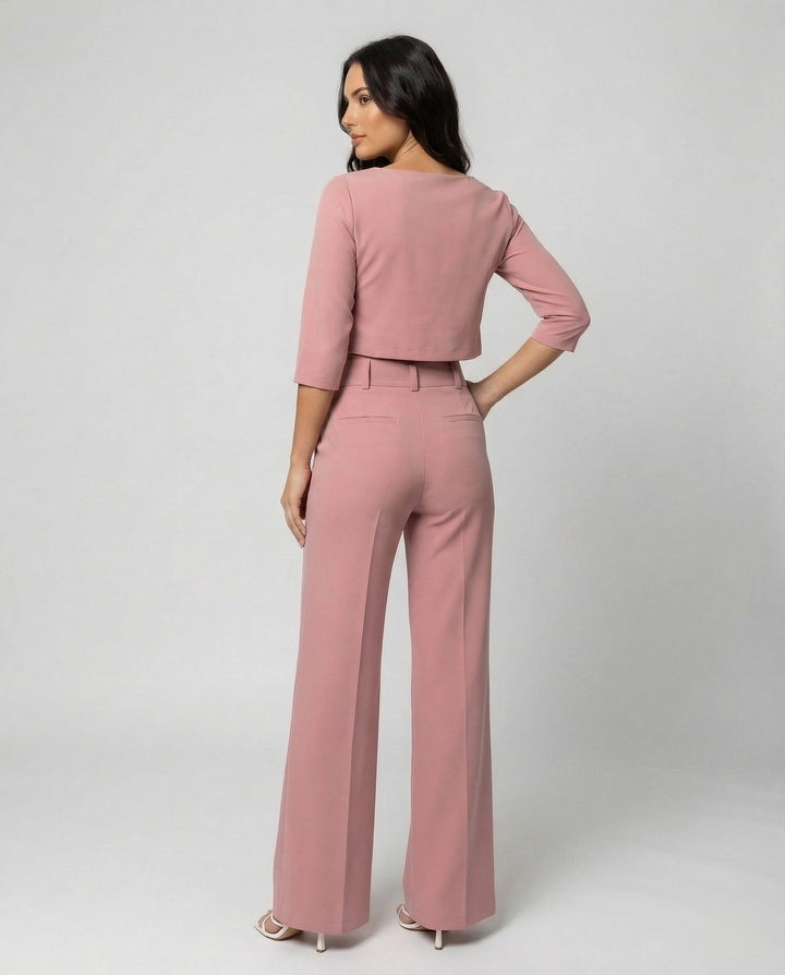 Chic women's two-piece tailored pants set featuring a stylish crop top and elegant elastic waist trousers.