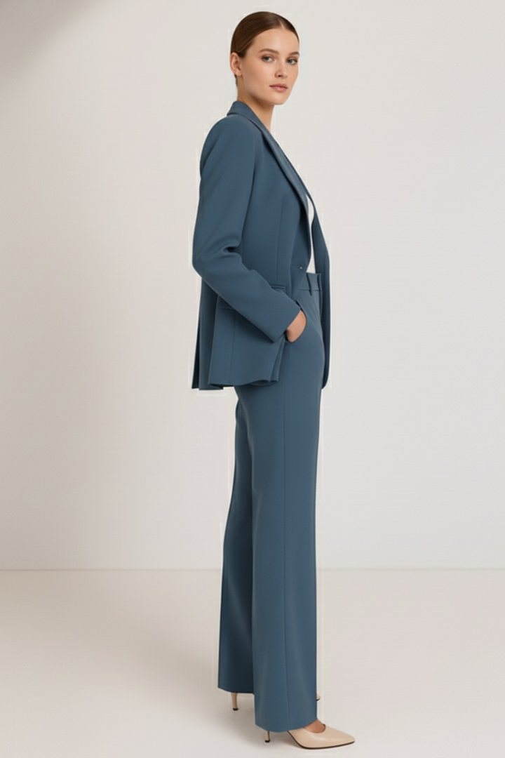 Modern women's formal trouser suit, featuring an elegant blazer & straight leg pants for smart casual.