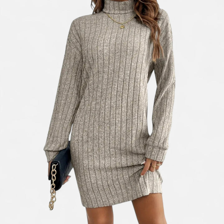 Sophisticated women's long-sleeve turtleneck midi dress, ideal elegant wear for autumn and winter.