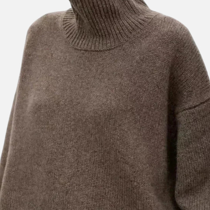 Elegant women's turtleneck sweater, a cozy long-sleeve knit for timeless winter fashion.