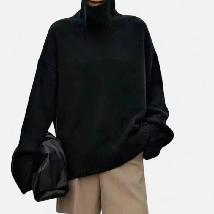 Soft knit long-sleeve women's turtleneck sweater, timeless and cozy for classic winter style.