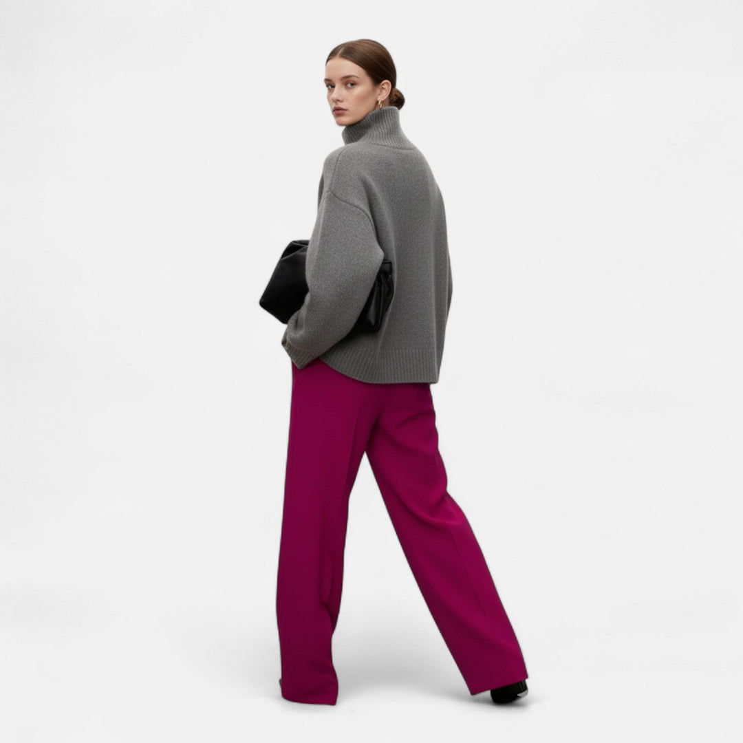 Elegant women's turtleneck sweater, a comfortable long-sleeve knit for cozy, timeless winter fashion.