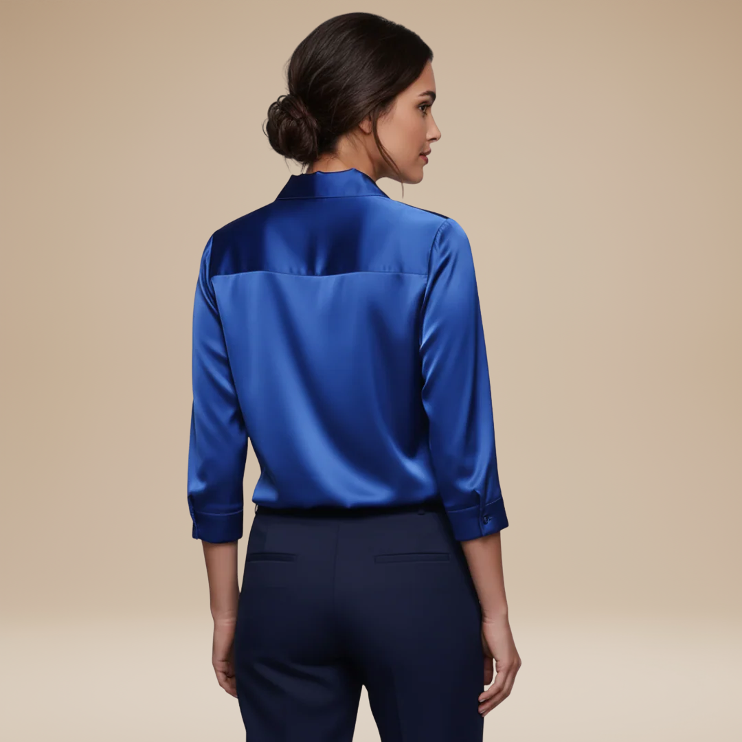 Elegant women's V-neck blouse, long sleeves, ideal for professional work settings.