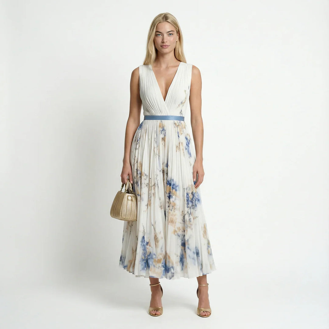 Elegant women's white floral pleated V-neck maxi dress, ideal for summer events & parties.