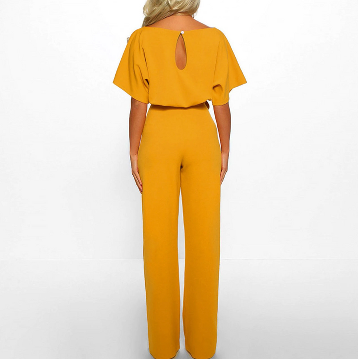 Comfortable & elegant women's wide leg jumpsuit with flutter sleeves, great for any special occasion.