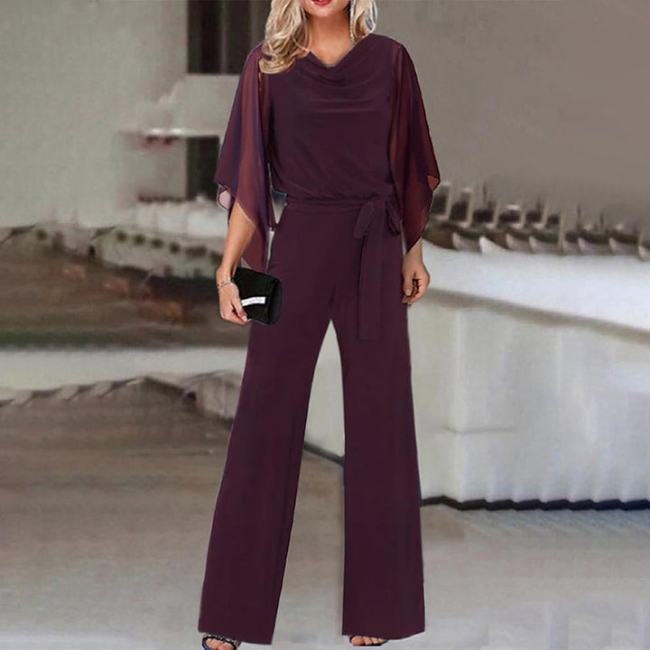 Stylish women's one-piece jumpsuit featuring a wide neckline, flowy draped sleeves, and a flattering wide leg design.