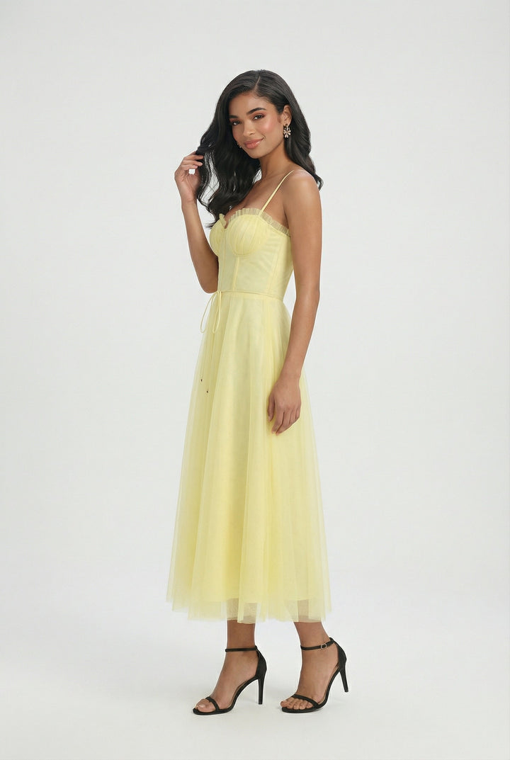 Elegant women's yellow A-line midi dress with corset bodice, perfect for summer occasions and parties.