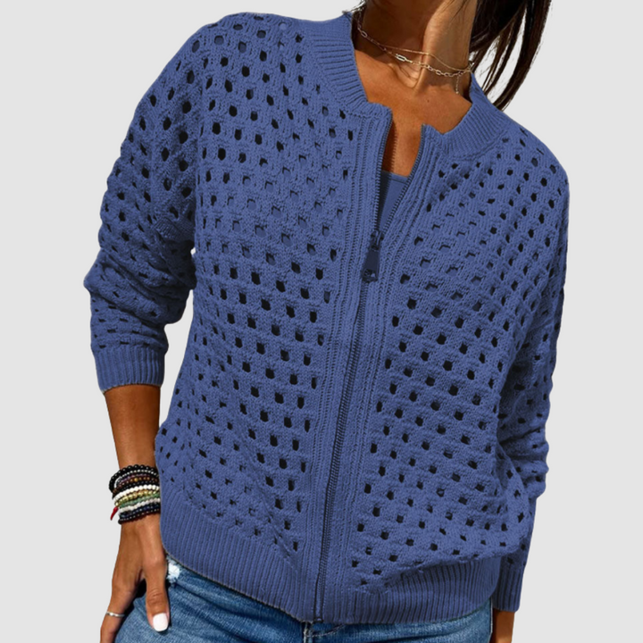 Model wearing a women's chic zipper cardigan. Elegant long sleeve outerwear, a comfortable and stylish layering piece.