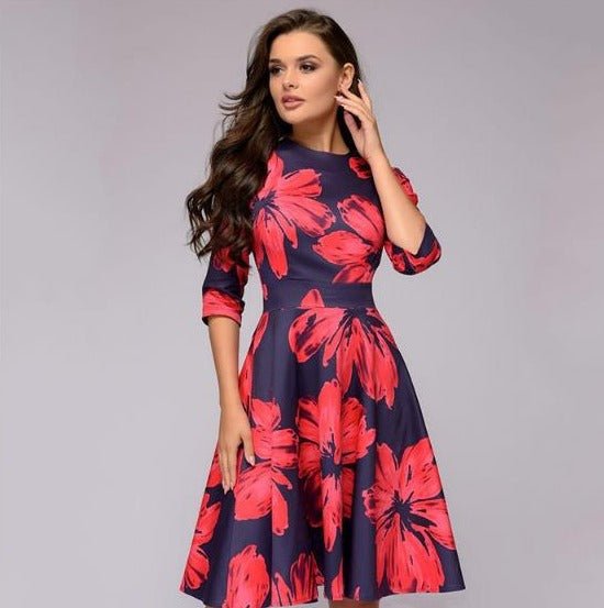 Back view of a women's floral print A-line knee-length dress.