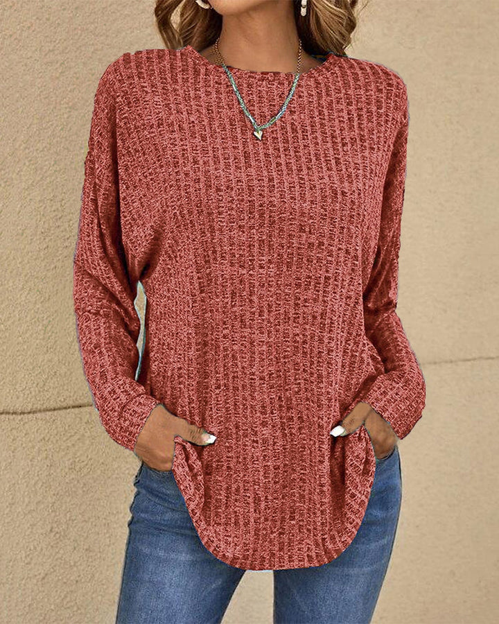 Stylish women's long sleeve crew neck pullover with a regular fit. Versatile casual jumper for comfortable everyday wear.