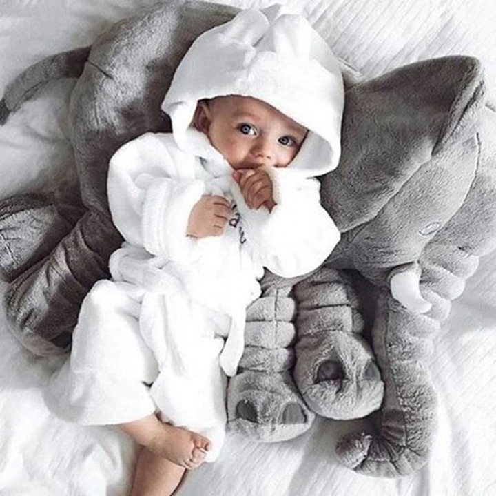 Children's soft elephant plush pillow, a comfortable & cuddly companion for playtime & naps.