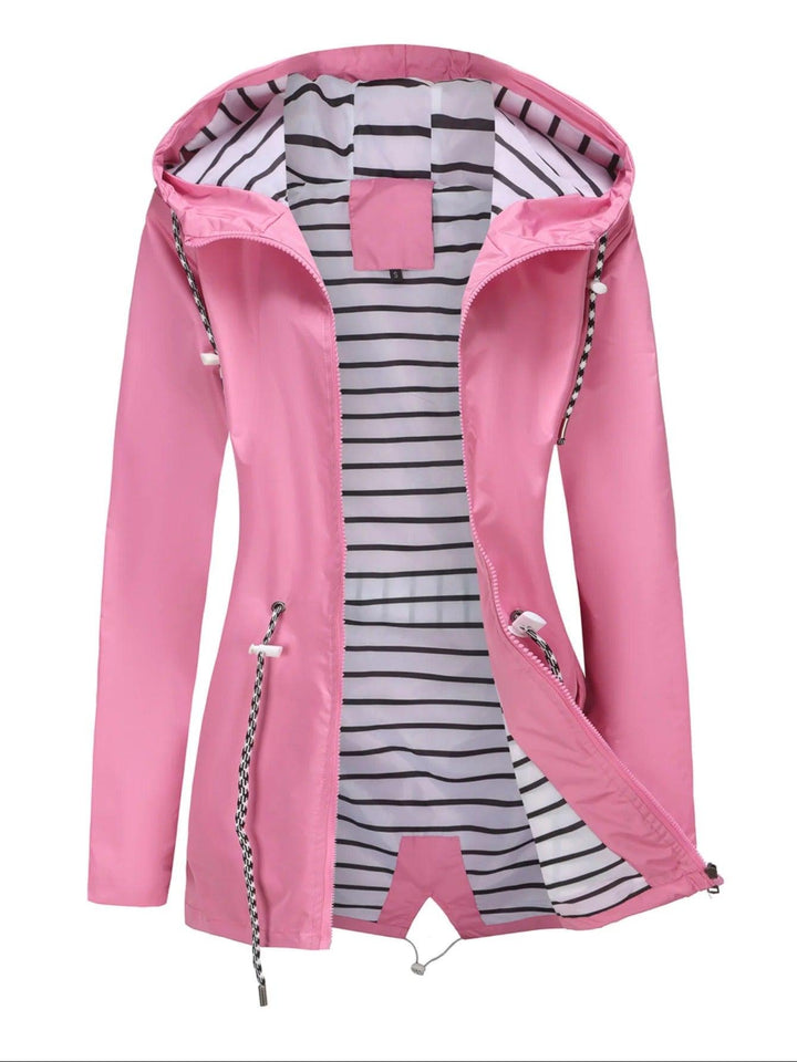 Sleek women's waterproof summer coat. Enjoy lightweight, weather-resistant outerwear for stylish, dry comfort.