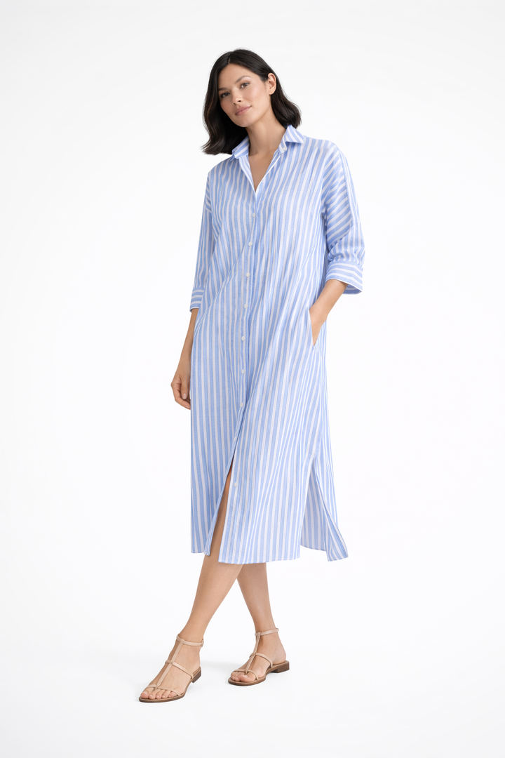 Relaxed fit women's striped midi shirt dress with button-down front, ideal for versatile summer and day fashion.