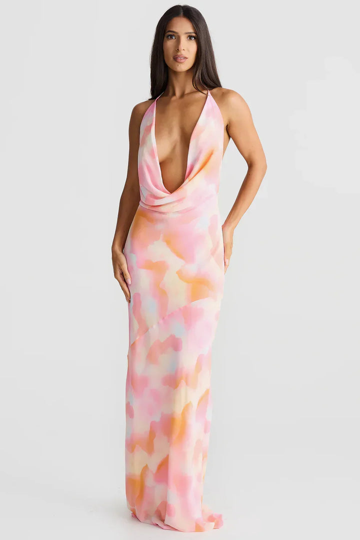 Chic women's long dress for elegant summer evenings. Perfect party wear with a timeless maxi style.
