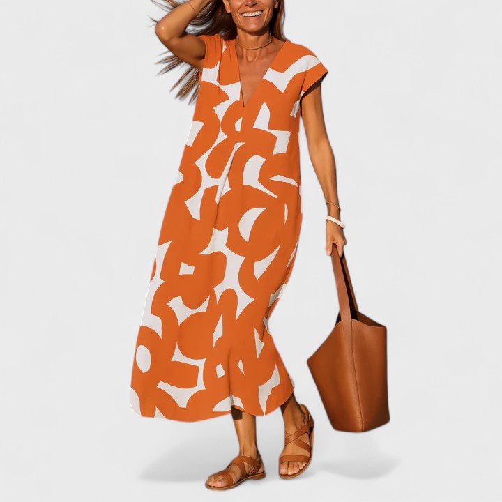 Comfortable women's flowing V-neck maxi dress. A versatile summer fashion staple for casual wear or chic holiday style.