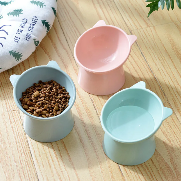 Ergonomic elevated cat & small dog food bowl. Promotes healthy digestion & prevents vomiting. Easy clean plastic.