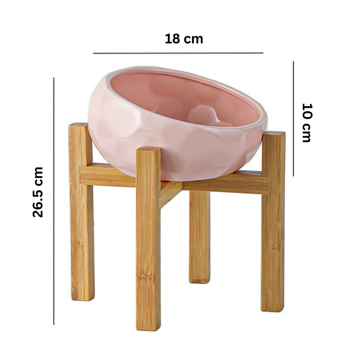 "Ergonomic elevated pet bowl with non-slip wooden stand, sleek design, blue color, enhances pet comfort and posture."