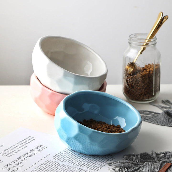 "Ergonomic elevated pet bowl with non-slip wooden stand, sleek design, blue color, enhances pet comfort and posture."