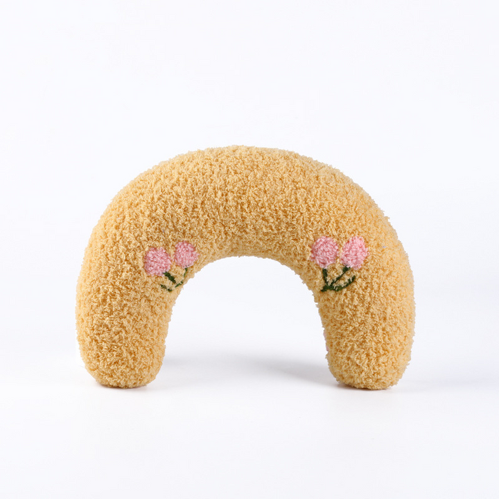 Cozy pet bed featuring an ergonomic neck support pillow, ensuring deep sleep & optimal comfort for all pets.