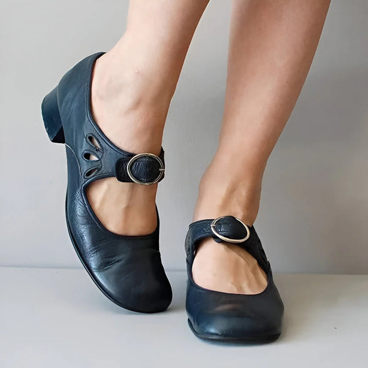Ergonomic women's orthopedic leather sandals with adjustable straps, designed for comfort and natural foot alignment.
