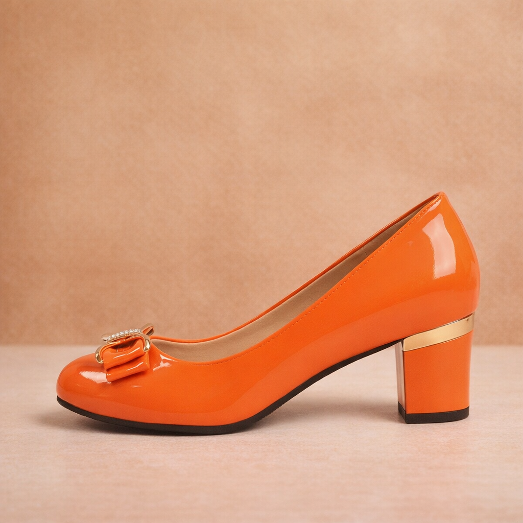 Women's block heel pumps featuring a sophisticated bow.
