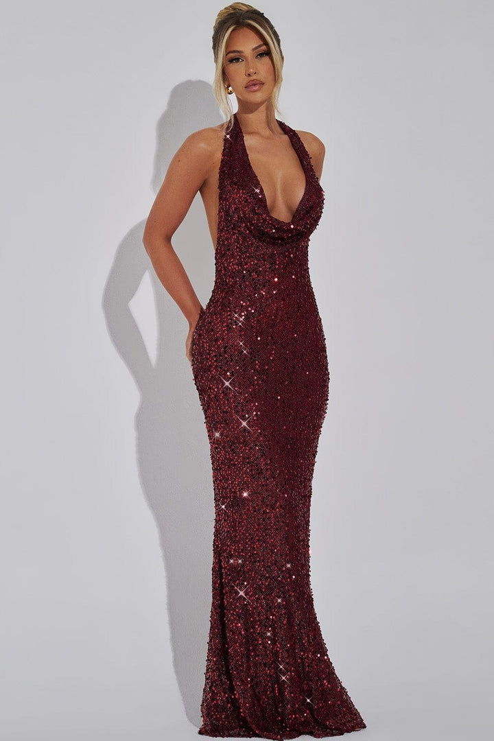Shimmering women's sequin party dress, halter design, open back. A beautiful evening maxi.