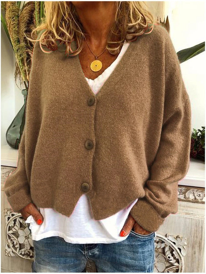 Essential women's V-neck button-front cardigan. Chic knitwear for casual style.