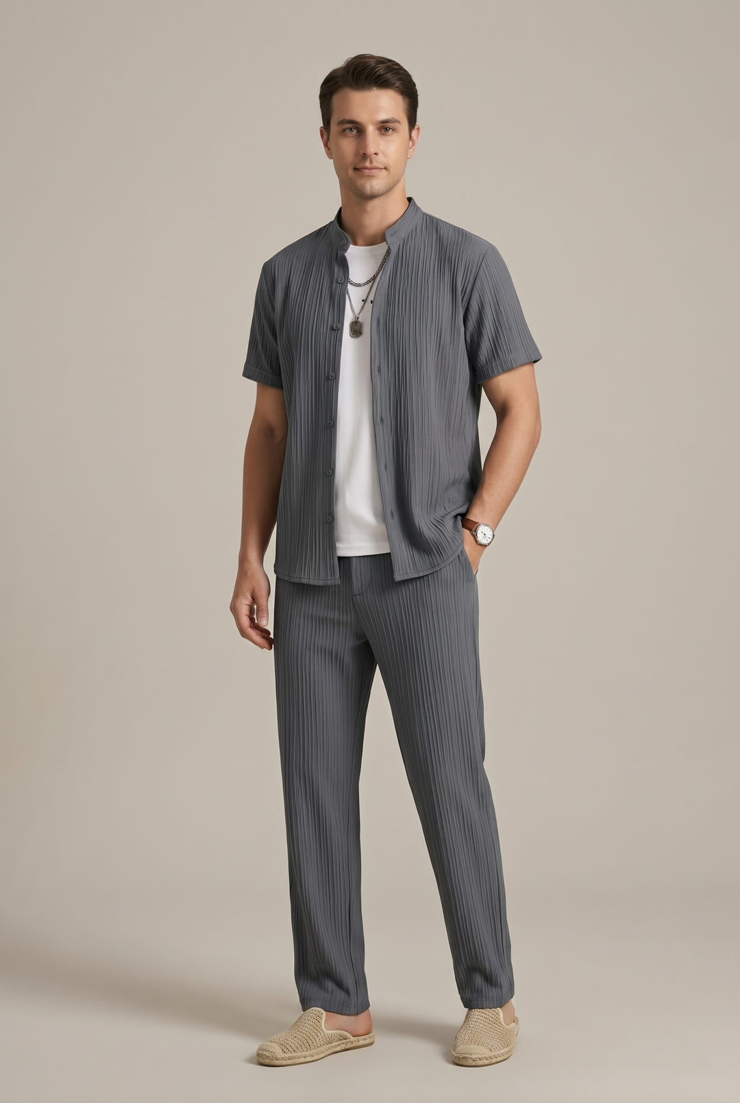 Fashionable men's striped casual wear two-piece set, including a relaxed short sleeve shirt and trousers.