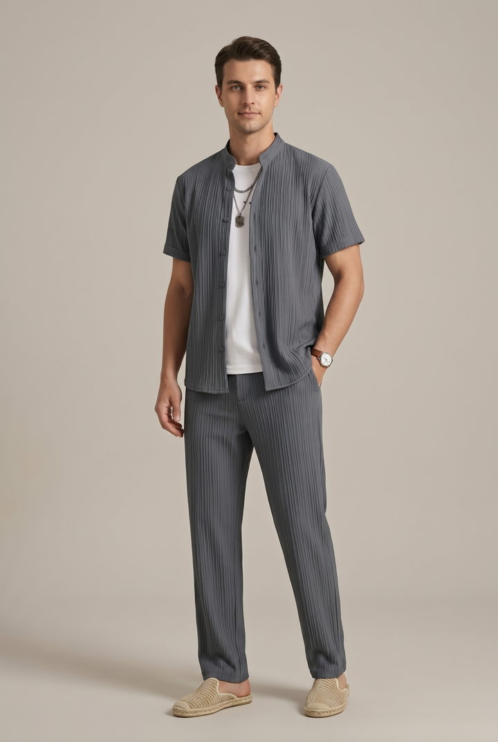 Fashionable men's striped casual wear two-piece set, including a relaxed short sleeve shirt and trousers.