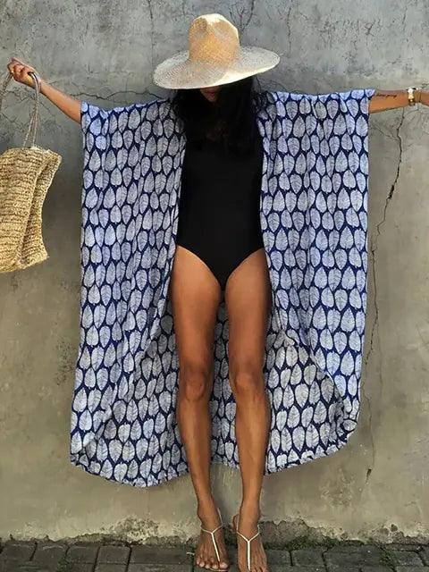 Vibrant tie-dye women's sarong, a flowy swimsuit cover-up for summer.