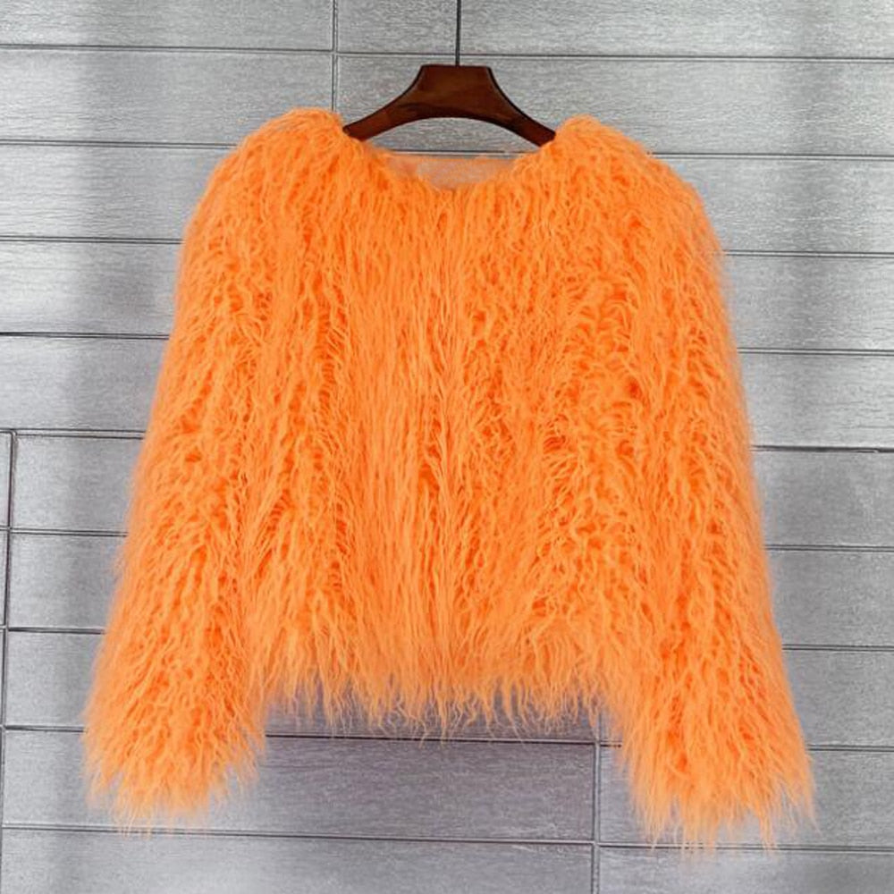 Women's elegant warm winter coat. Stylish long-sleeve outerwear for cozy autumn and winter fashion.