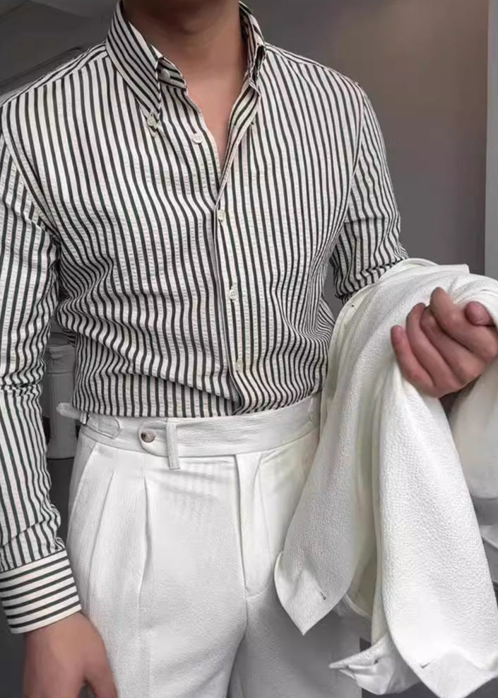 Elevate your wardrobe with this stylish men's striped button-down shirt. Long sleeve, comfortable fit for modern men's fashion.