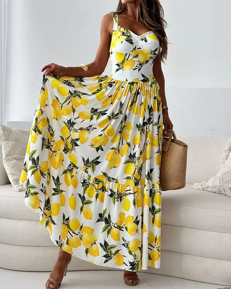 Cheerful women's midi strap dress featuring a vibrant lemon print, ideal for spring & summer casual fashion.