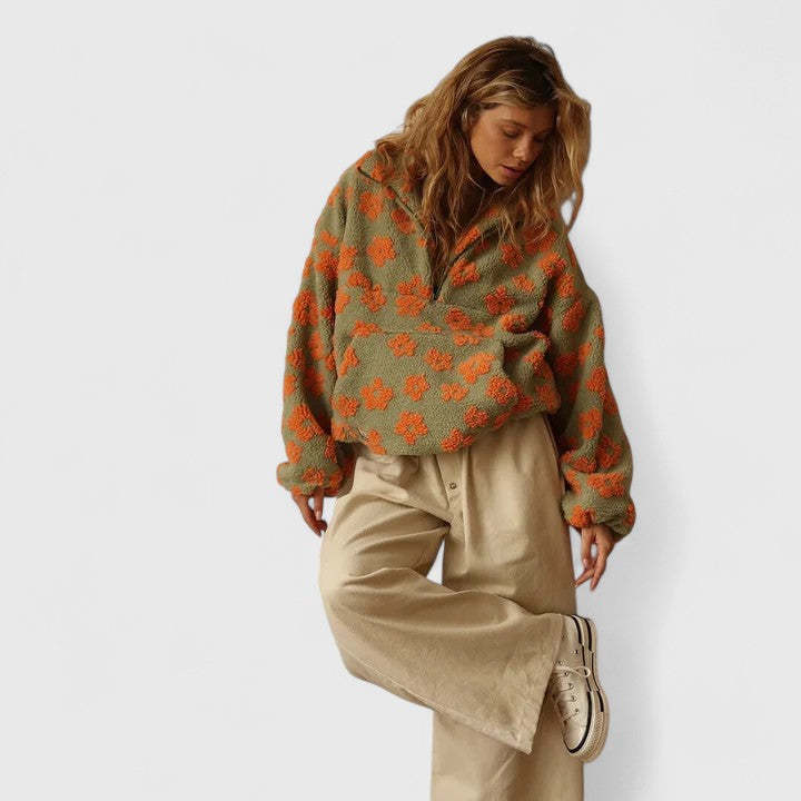 Colorful floral half-zip women's sweater, a versatile long-sleeve top for casual everyday and spring style.