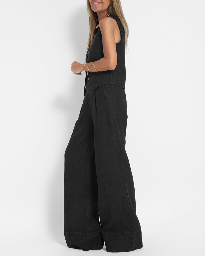 Stylish women's wide leg pants and sleeveless vest co-ord set for a modern spring look.