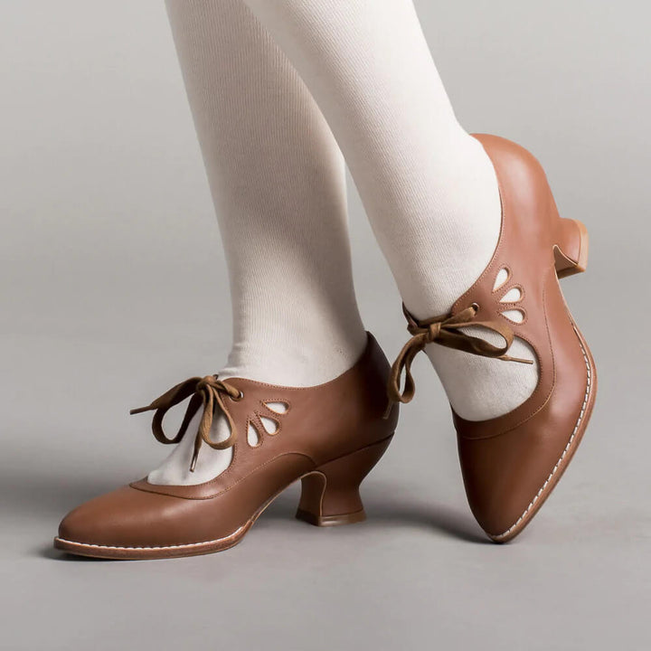 Chic women's vintage Mary Jane block heels, perfect for formal events or adding a retro touch to any outfit.
